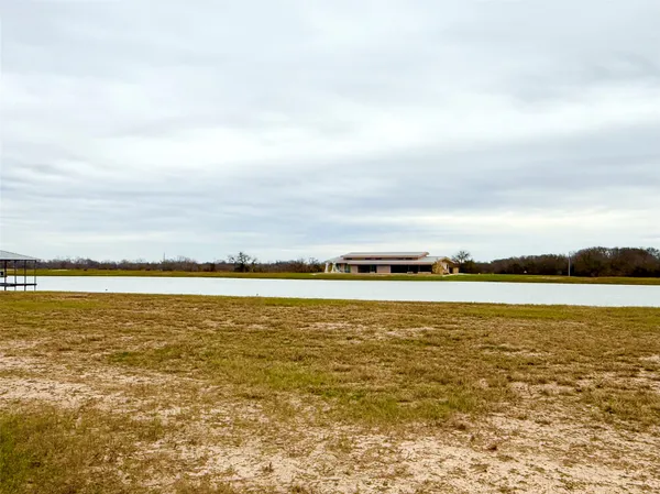 a view of a sign board with a lake view