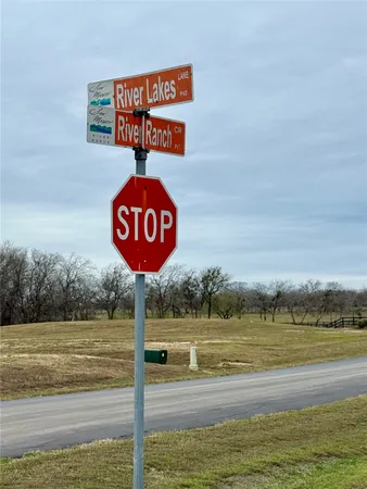 a view of a lake with a big yard