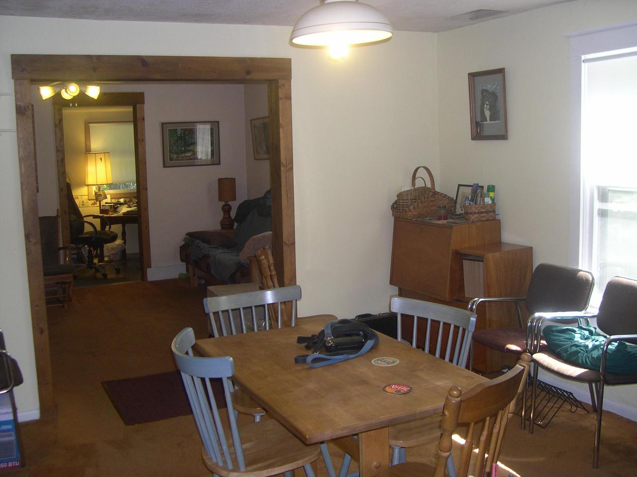 45039 Locust Ridge Road Pocono Lake, PA 18347 - Photo 4 of 9 a view of a dining room with furniture and wooden floor
