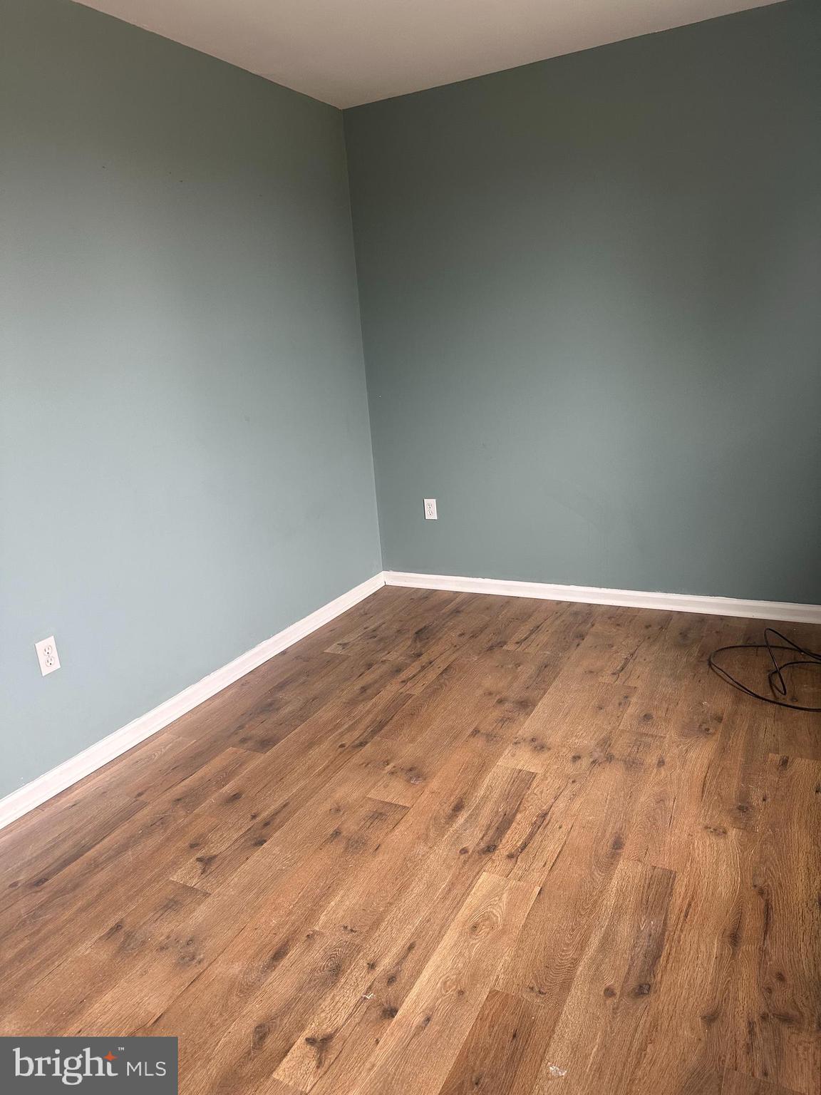 2073 Clover Mill Road Quakertown, PA 18951 - Photo 13 of 17 a view of empty room with wooden floor