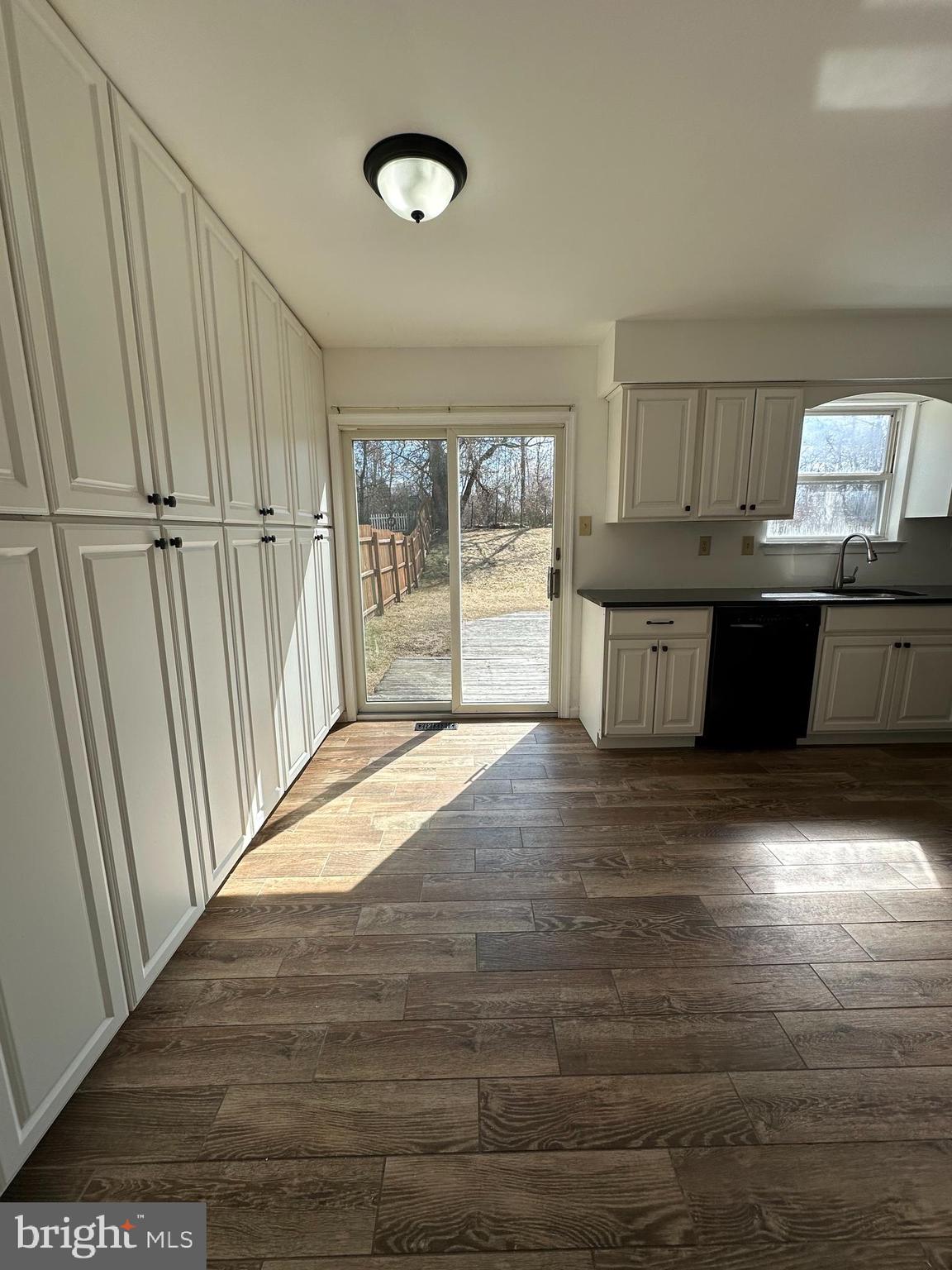 2073 Clover Mill Road Quakertown, PA 18951 - Photo 5 of 17 a kitchen with granite countertop a stove a sink and a refrigerator