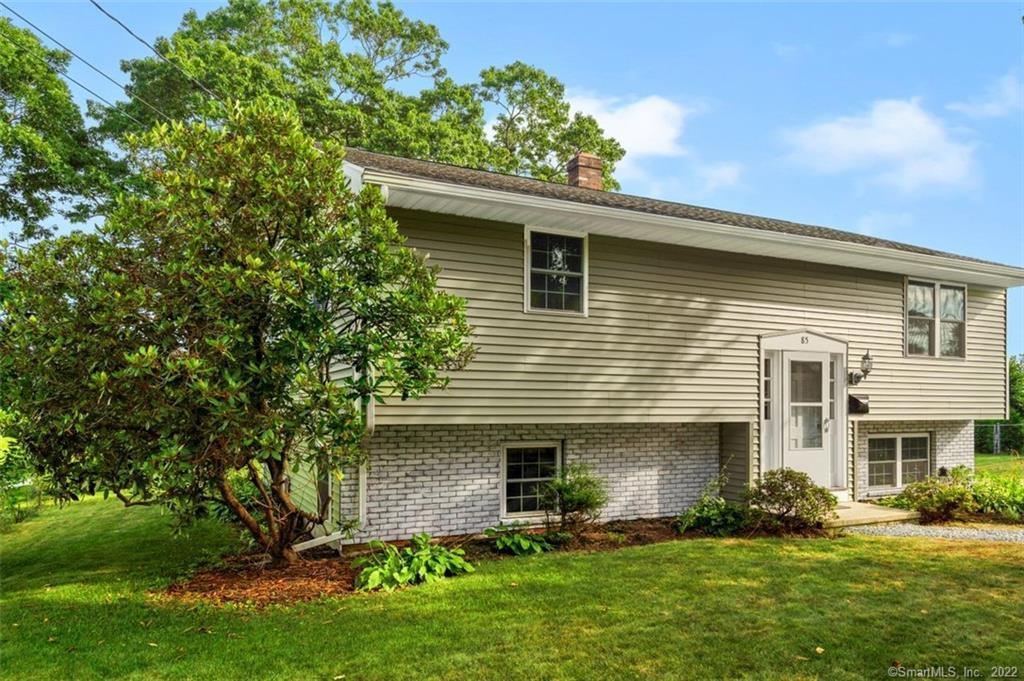 85 Pratt Road Clinton, CT 06413 - Photo 1 of 1 a front view of house with yard and green space