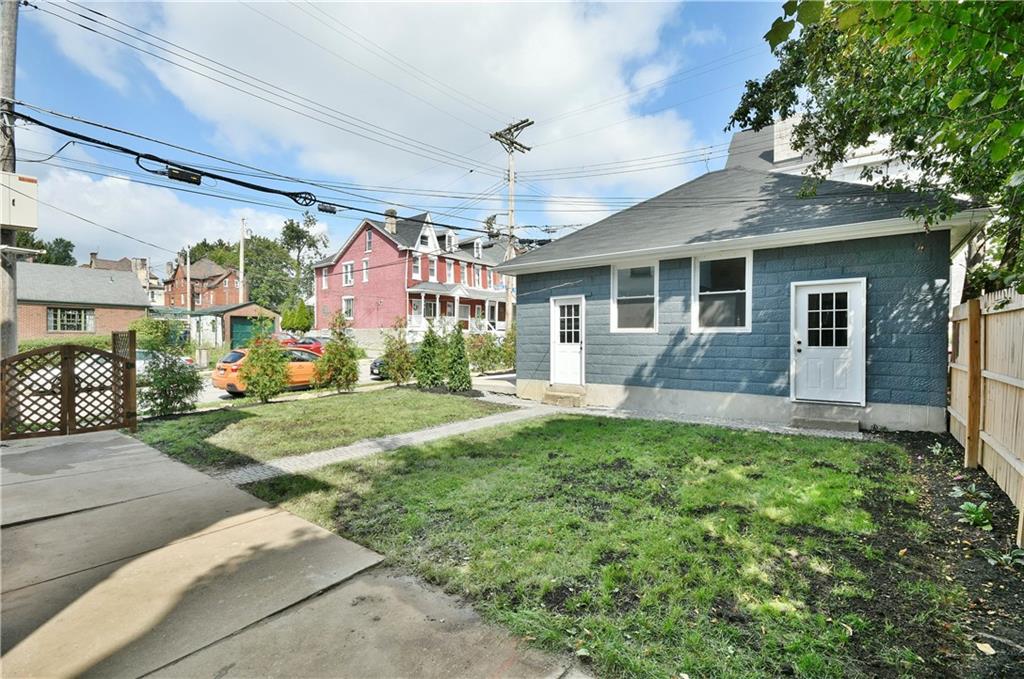6029 Stanton Avenue Pittsburgh, PA 15206 - Photo 25 of 27 a front view of house with yard and green space