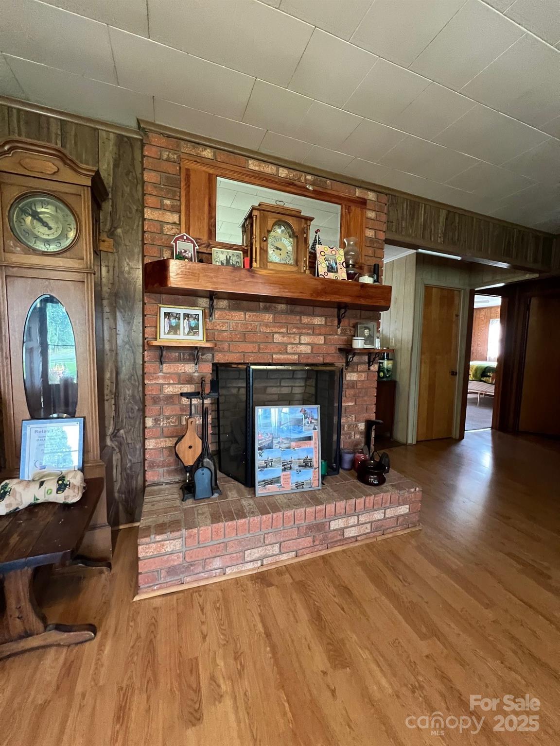 906 East Monbo Road Statesville, NC 28677 - Photo 17 of 30 a living room with furniture and a fireplace
