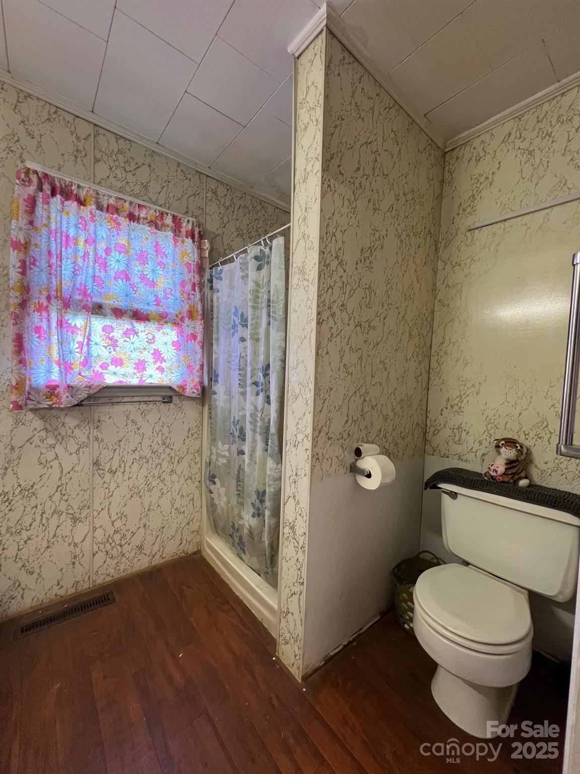 906 East Monbo Road Statesville, NC 28677 - Photo 21 of 30 a bathroom with a toilet and a shower