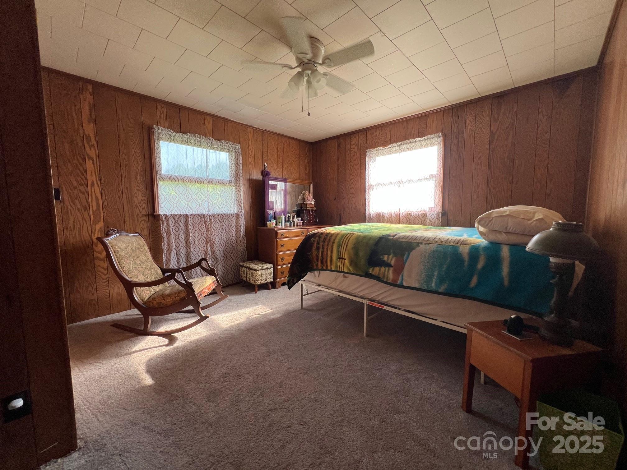 906 East Monbo Road Statesville, NC 28677 - Photo 22 of 30 a living room with furniture and a large window