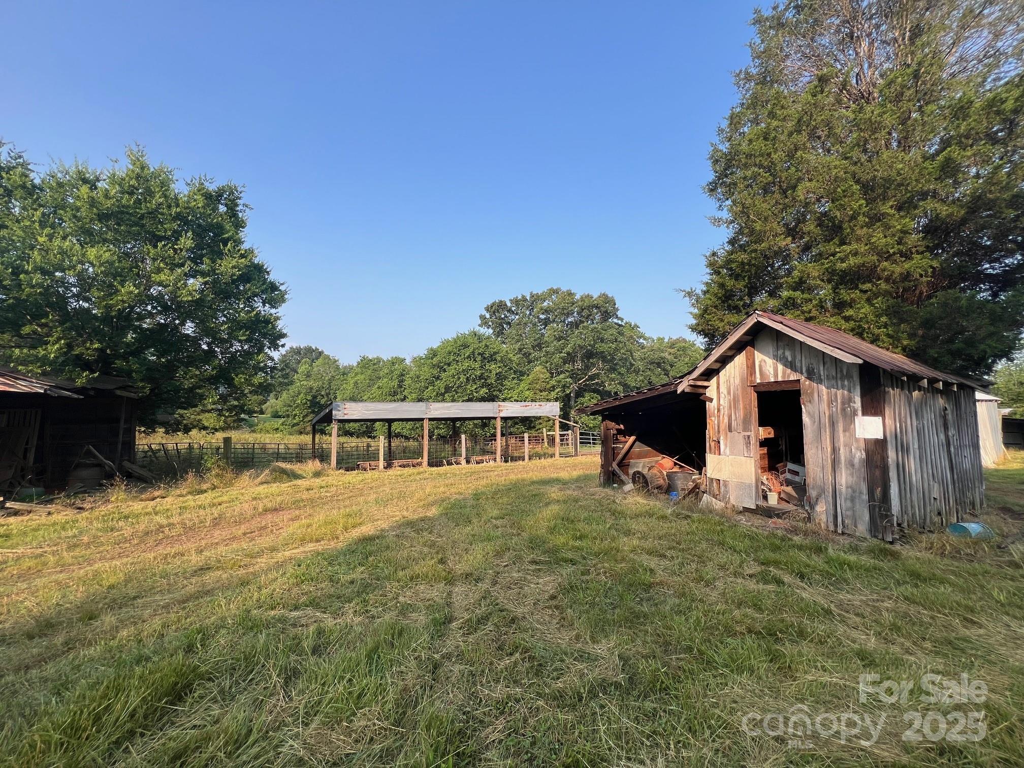 906 East Monbo Road Statesville, NC 28677 - Photo 5 of 30 a view of a house with a yard
