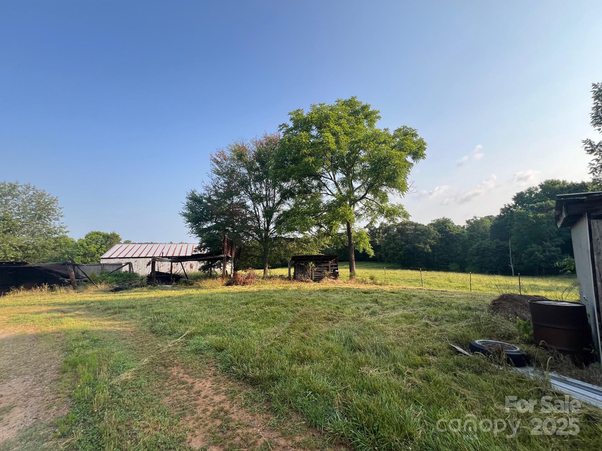 906 East Monbo Road Statesville, NC 28677 - Photo 6 of 30 a view of a playground with basketball court
