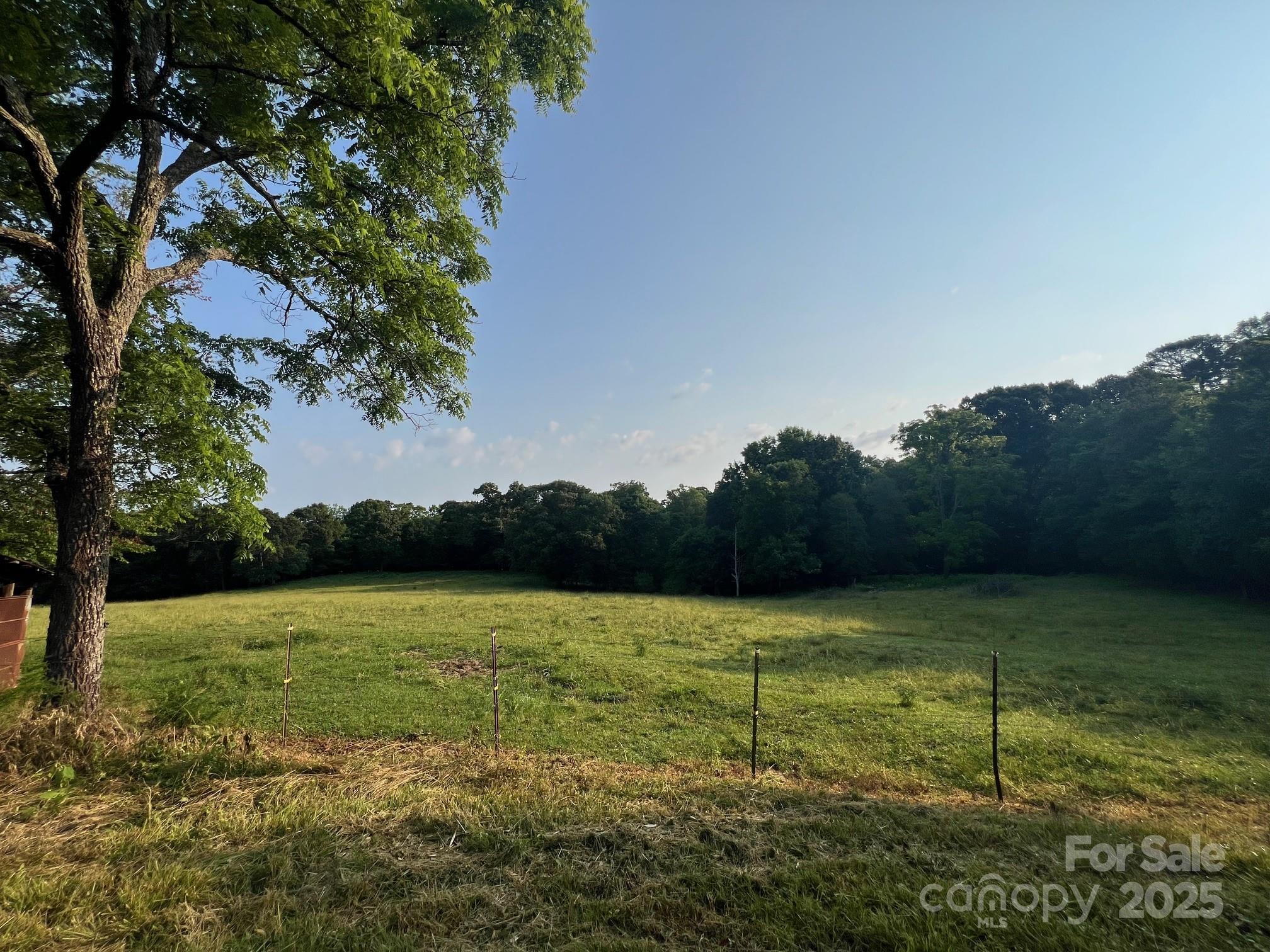 906 East Monbo Road Statesville, NC 28677 - Photo 7 of 30 a view of a field with an outdoor space