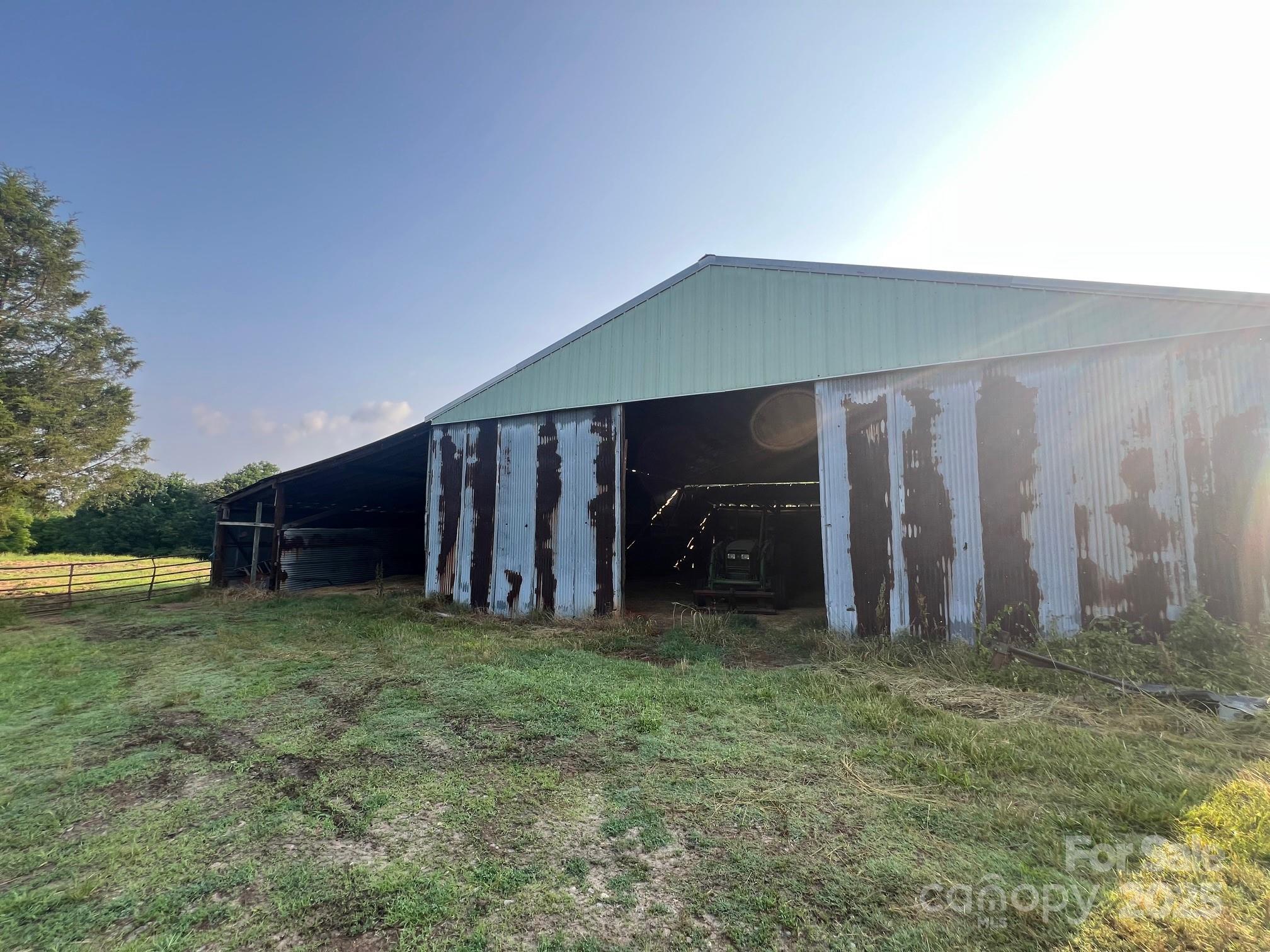 906 East Monbo Road Statesville, NC 28677 - Photo 9 of 30 a view of a backyard