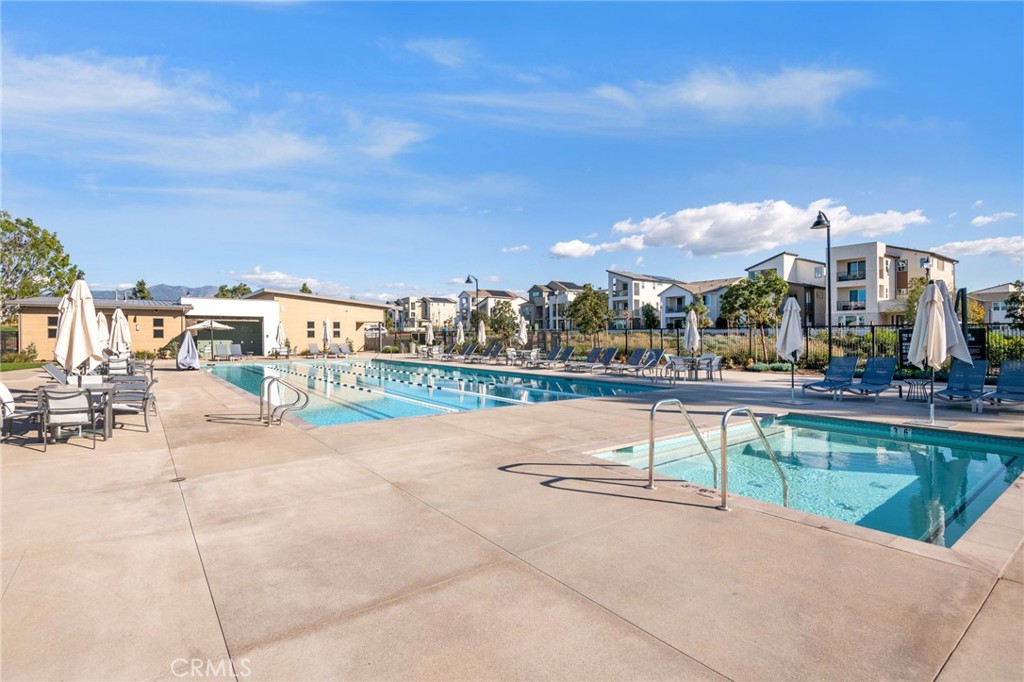 121 Baluster Irvine, CA 92618 - Photo 73 of 80 a view of a swimming pool and a patio