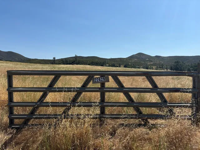 a view of outdoor space with wooden floor and city view