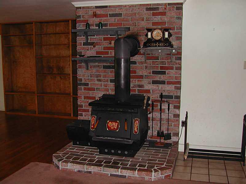 511 Kansas Road Bridgton, ME 04009 - Photo 8 of 14 Dining Room. Large wood stove on...