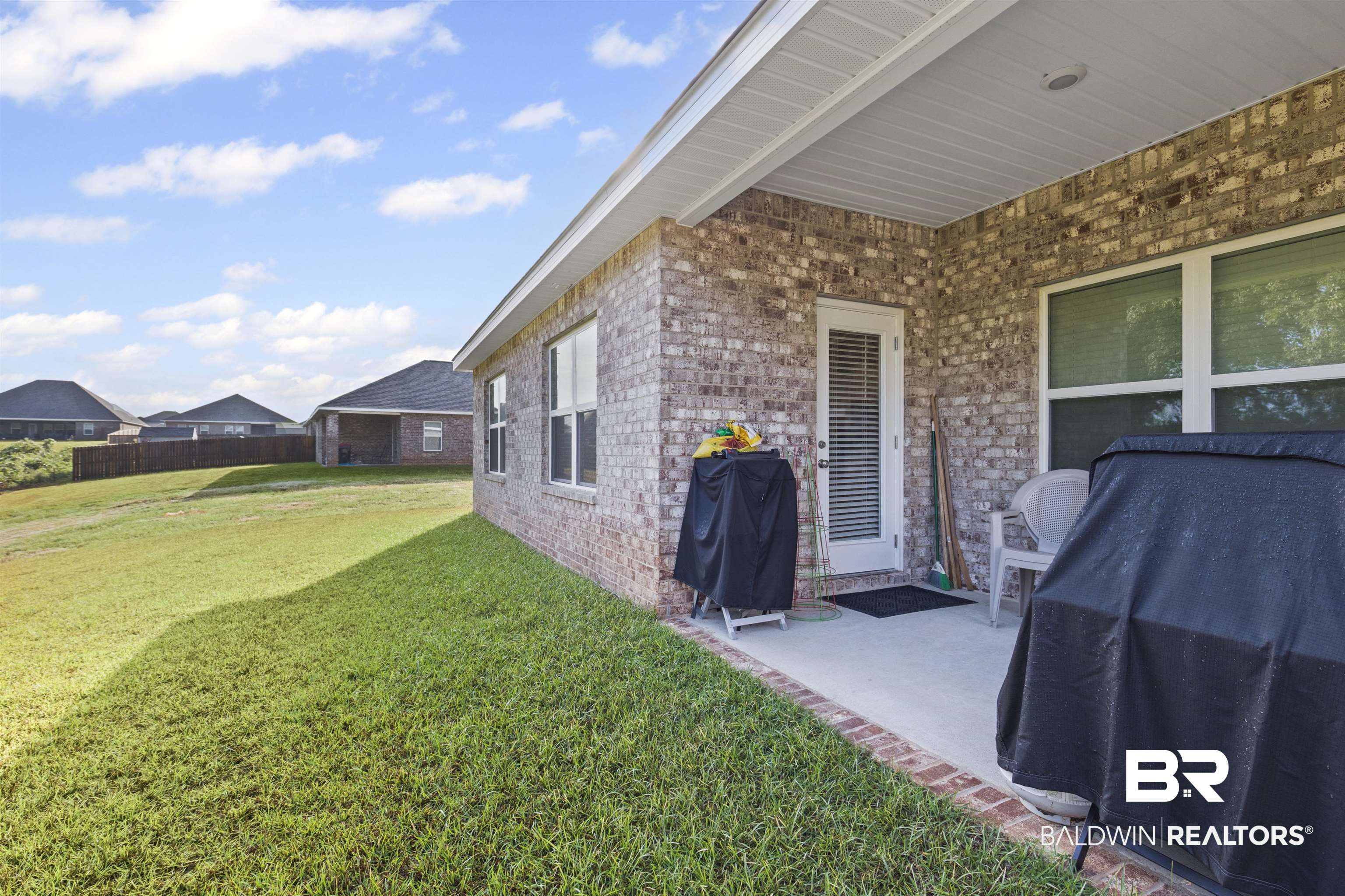 10564 Heirloom Road South Mobile, AL 36608 - Photo 21 of 24 View of yard with a patio