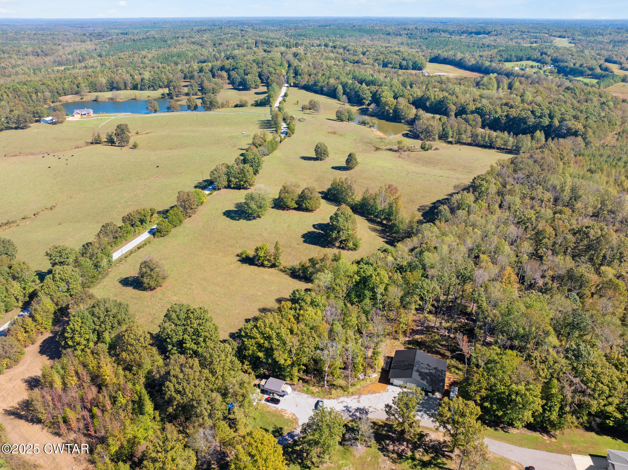 0 Mt Moriah Road Reagan, TN 38368 - Photo 3 of 7 a view of a lake with a mountain