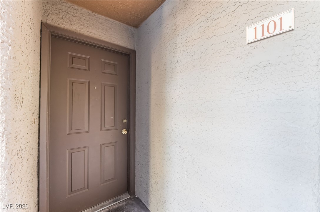 2200 South Fort Apache Road, Unit 1101 Las Vegas, NV 89117 - Photo 33 of 42 Entrance to property with stucco siding