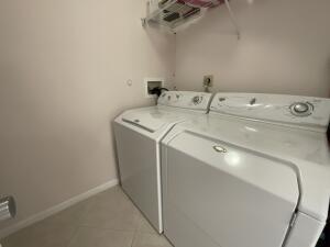 18856 Argosy Drive, Unit C Boca Raton, FL 33496 - Photo 47 of 62 a utility room with dryer and washer