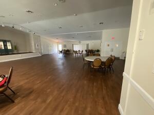 18856 Argosy Drive, Unit C Boca Raton, FL 33496 - Photo 61 of 62 a view of a work space with furniture and wooden floor