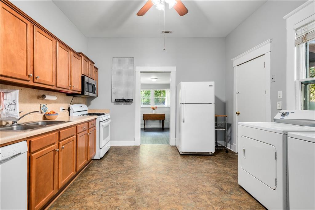1323 La France Street Northeast, Unit 2 Atlanta, GA 30307 - Photo 18 of 25 a kitchen with a refrigerator a sink and dishwasher