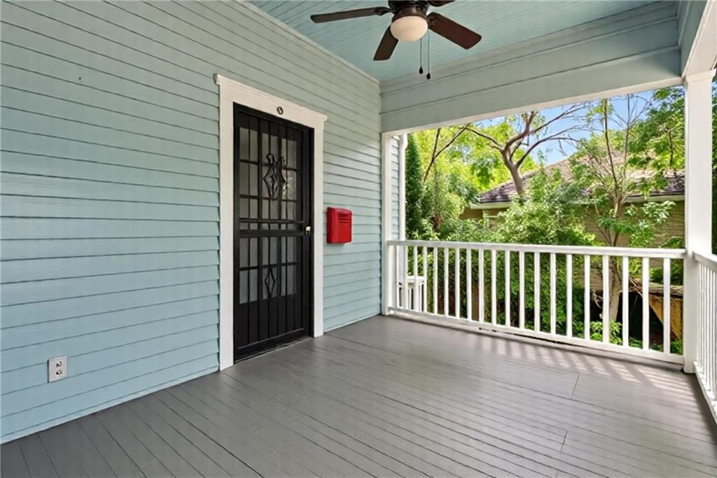 1323 La France Street Northeast, Unit 2 Atlanta, GA 30307 - Photo 4 of 25 a view of a porch with wooden floor and deck