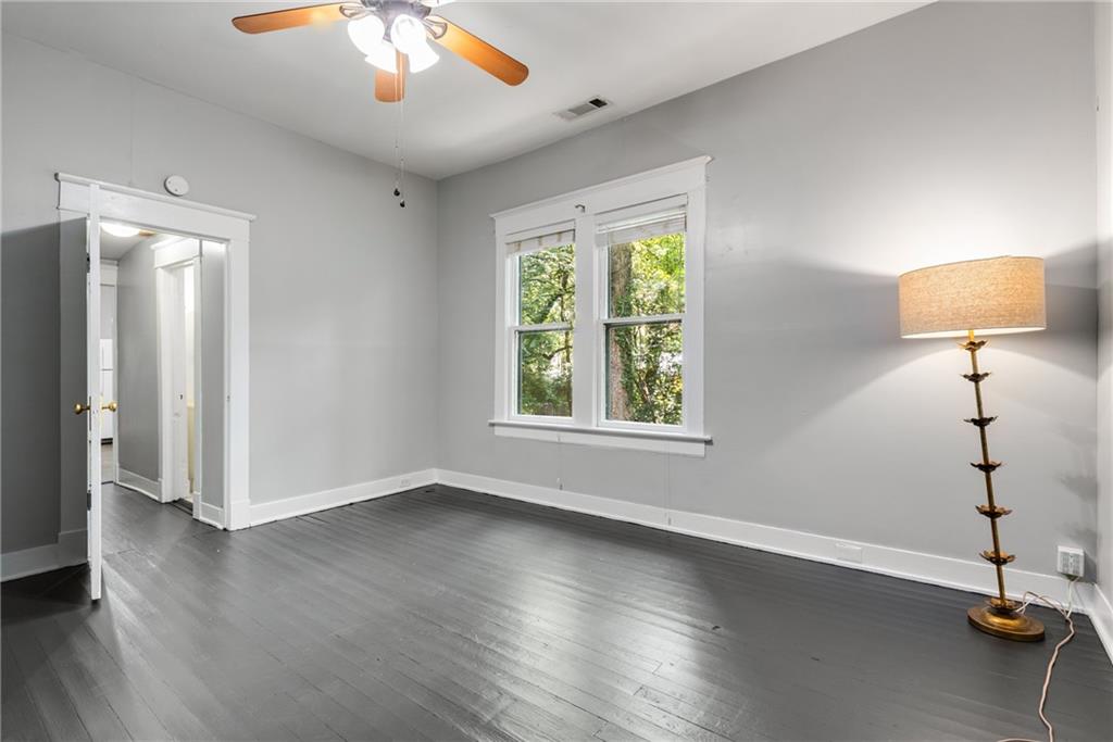 1323 La France Street Northeast, Unit 2 Atlanta, GA 30307 - Photo 10 of 25 a view of wooden floor and windows in a room