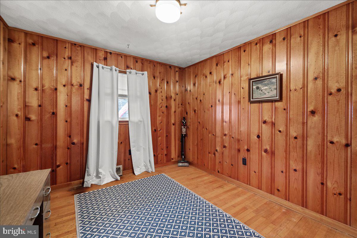 2447 Rittenour Road Edinburg, VA 22824 - Photo 21 of 40 a view of a entryway with wooden walls