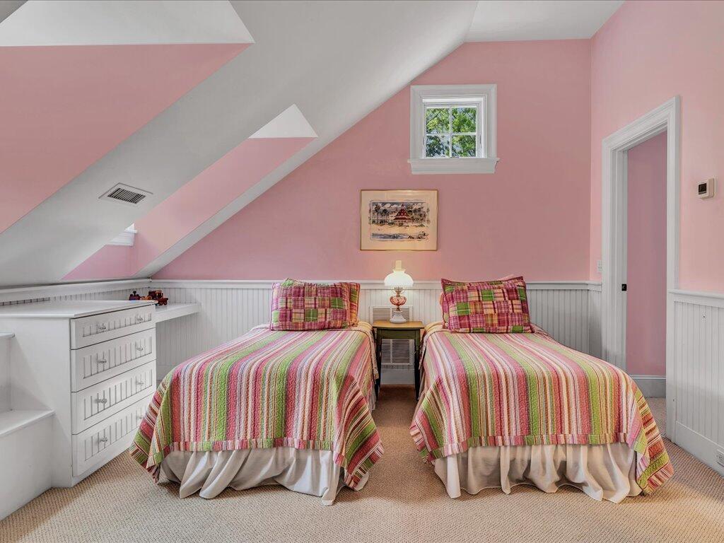 160 Cedar Tree Neck Road Marstons Mills, MA 02648 - Photo 24 of 44 a bedroom with a bed and a couch