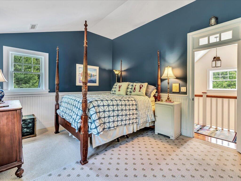 160 Cedar Tree Neck Road Marstons Mills, MA 02648 - Photo 26 of 44 a bedroom with a bed and a cabinets