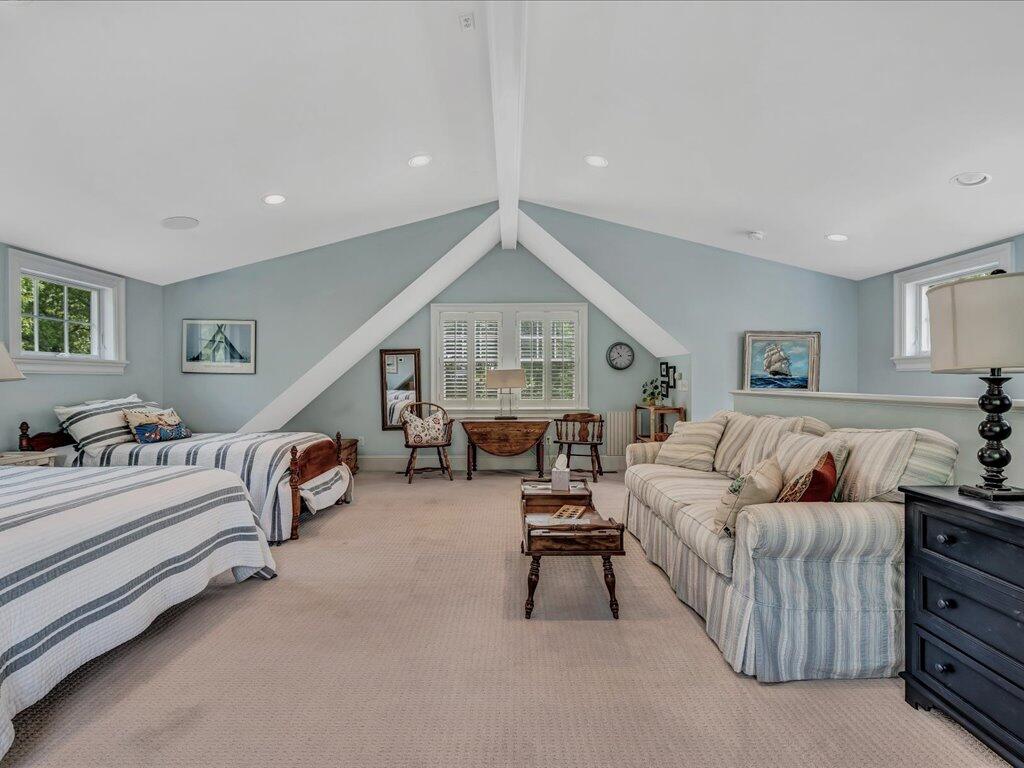 160 Cedar Tree Neck Road Marstons Mills, MA 02648 - Photo 29 of 44 a living room with furniture and a large window