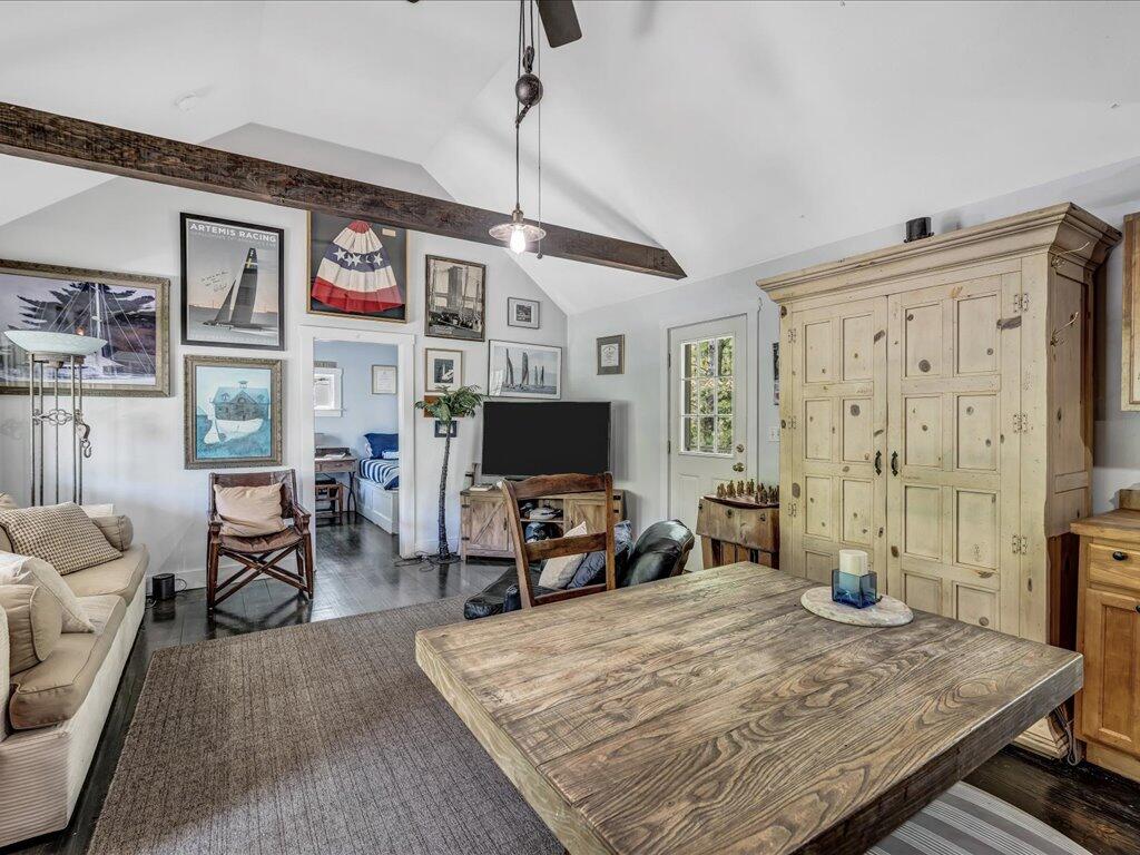 160 Cedar Tree Neck Road Marstons Mills, MA 02648 - Photo 32 of 44 a living room with furniture and a flat screen tv
