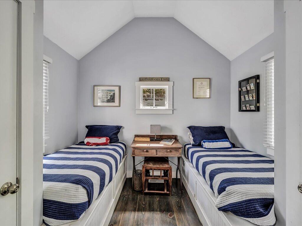 160 Cedar Tree Neck Road Marstons Mills, MA 02648 - Photo 35 of 44 a bedroom with a bed and wall painting
