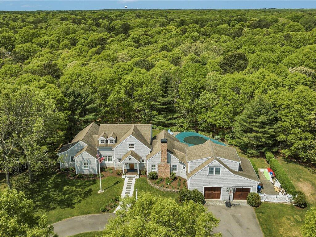 160 Cedar Tree Neck Road Marstons Mills, MA 02648 - Photo 39 of 44 an aerial view of a house with a yard