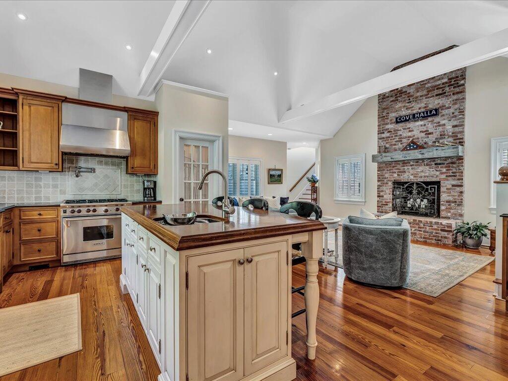 160 Cedar Tree Neck Road Marstons Mills, MA 02648 - Photo 7 of 44 a kitchen with stainless steel appliances granite countertop a stove and a refrigerator
