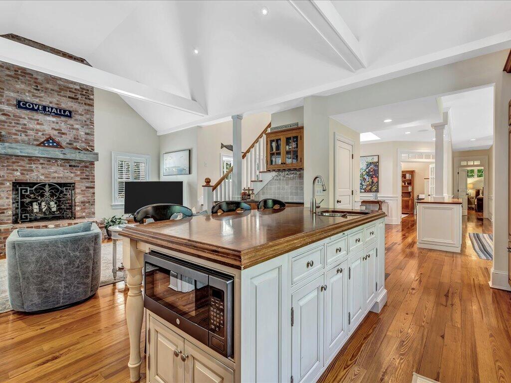 160 Cedar Tree Neck Road Marstons Mills, MA 02648 - Photo 9 of 44 a kitchen with stove a sink and a refrigerator