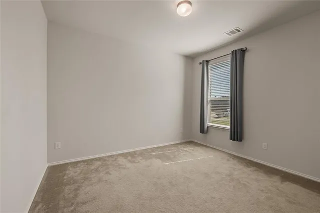 a bathroom with a double vanity sink toilet and shower