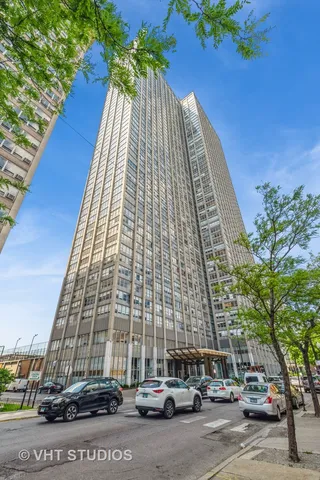 a large white kitchen with a large window