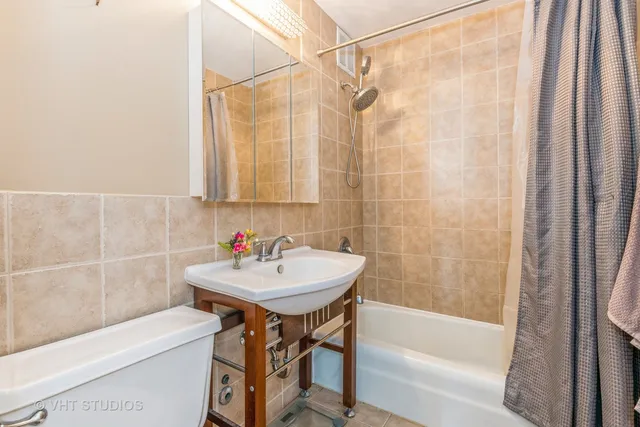 a patio with a table and chairs