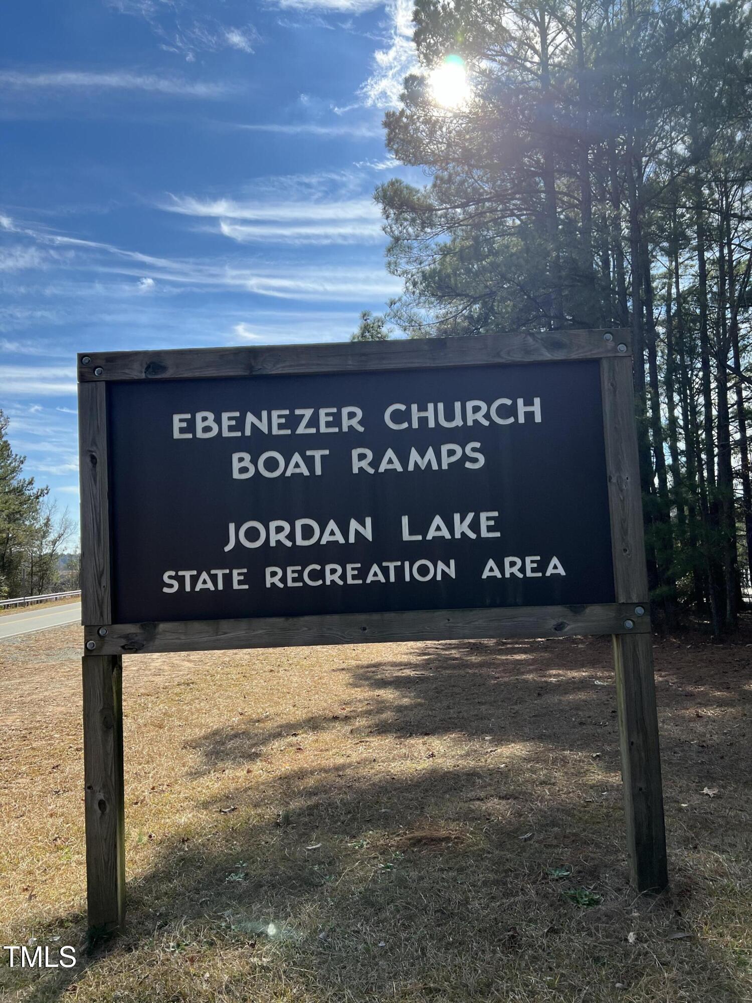 39 Anfield Road New Hill, NC 27562 - Photo 11 of 12 a street sign on the side of a building
