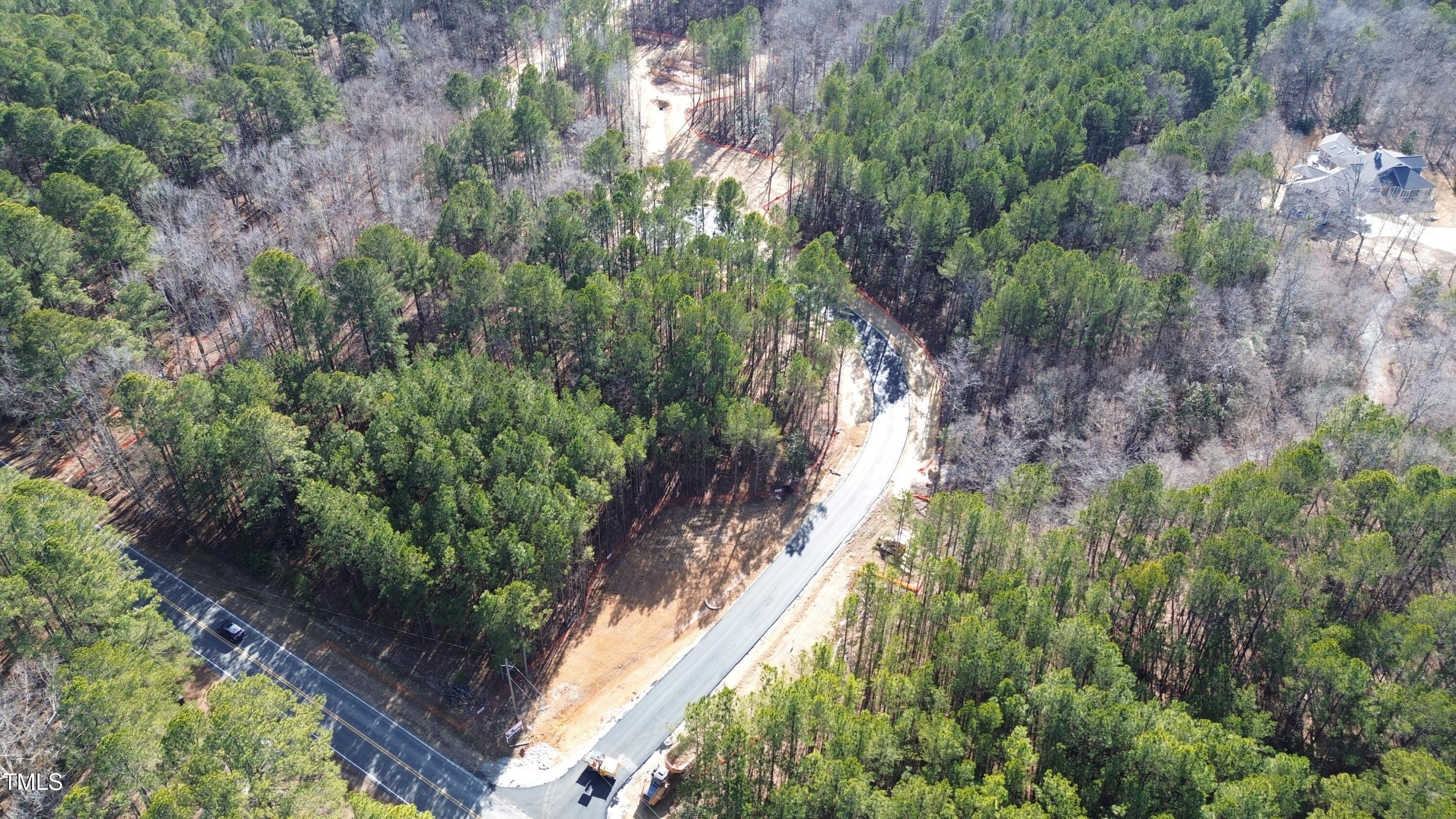 39 Anfield Road New Hill, NC 27562 - Photo 3 of 12 a backyard of a house with lots of green space