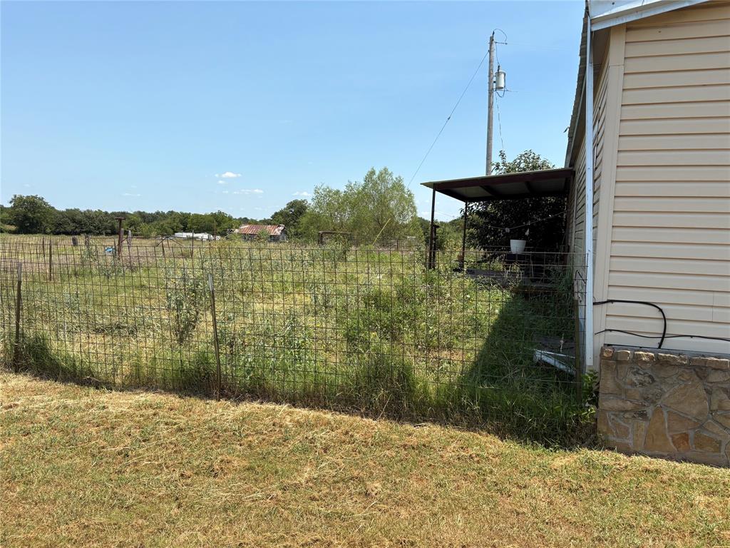912 Highway 36 W Rising Star Tx 76471 West Rising Star, TX 76471 - Photo 10 of 28 a view of a terrace with a garden