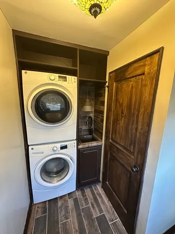 a utility room with dryer and washer