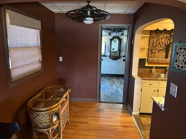 a view of an entryway with a chandelier