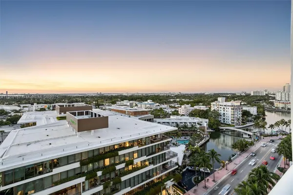 a bedroom with a bed and a desk