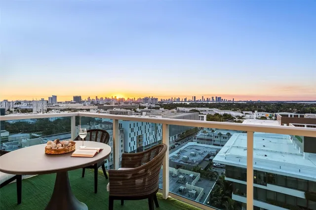 a bathroom with a double vanity sink mirror and shower