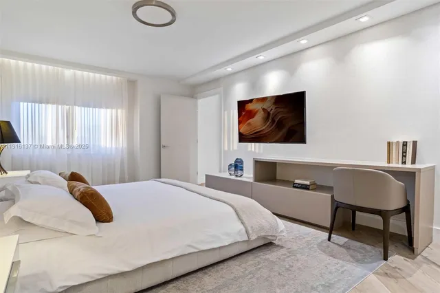 a kitchen with a sink cabinets and window