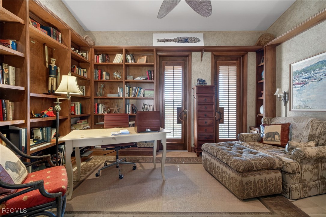 816 Birdie View Point Sanibel, FL 33957 - Photo 13 of 43 a bedroom with a bed furniture and a book shelf