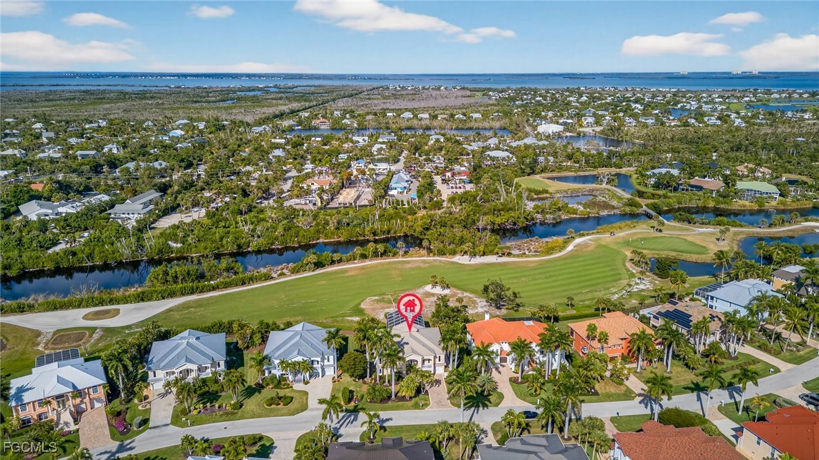 816 Birdie View Point Sanibel, FL 33957 - Photo 41 of 43 an aerial view of residential houses with outdoor space and swimming pool