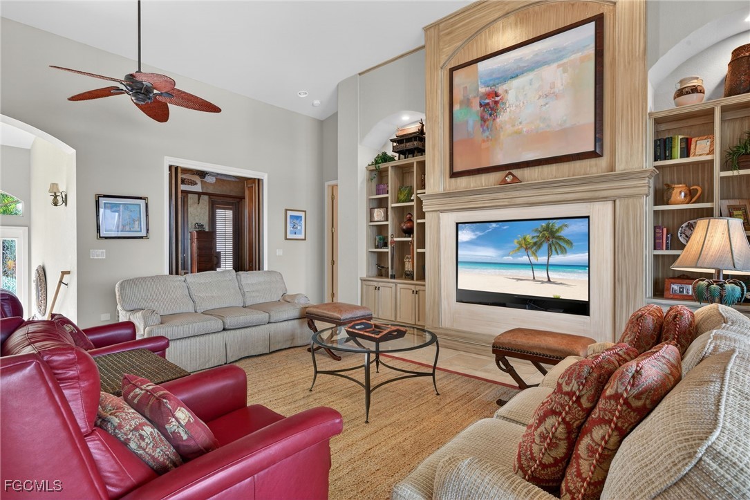 816 Birdie View Point Sanibel, FL 33957 - Photo 6 of 43 a living room with furniture and a flat screen tv