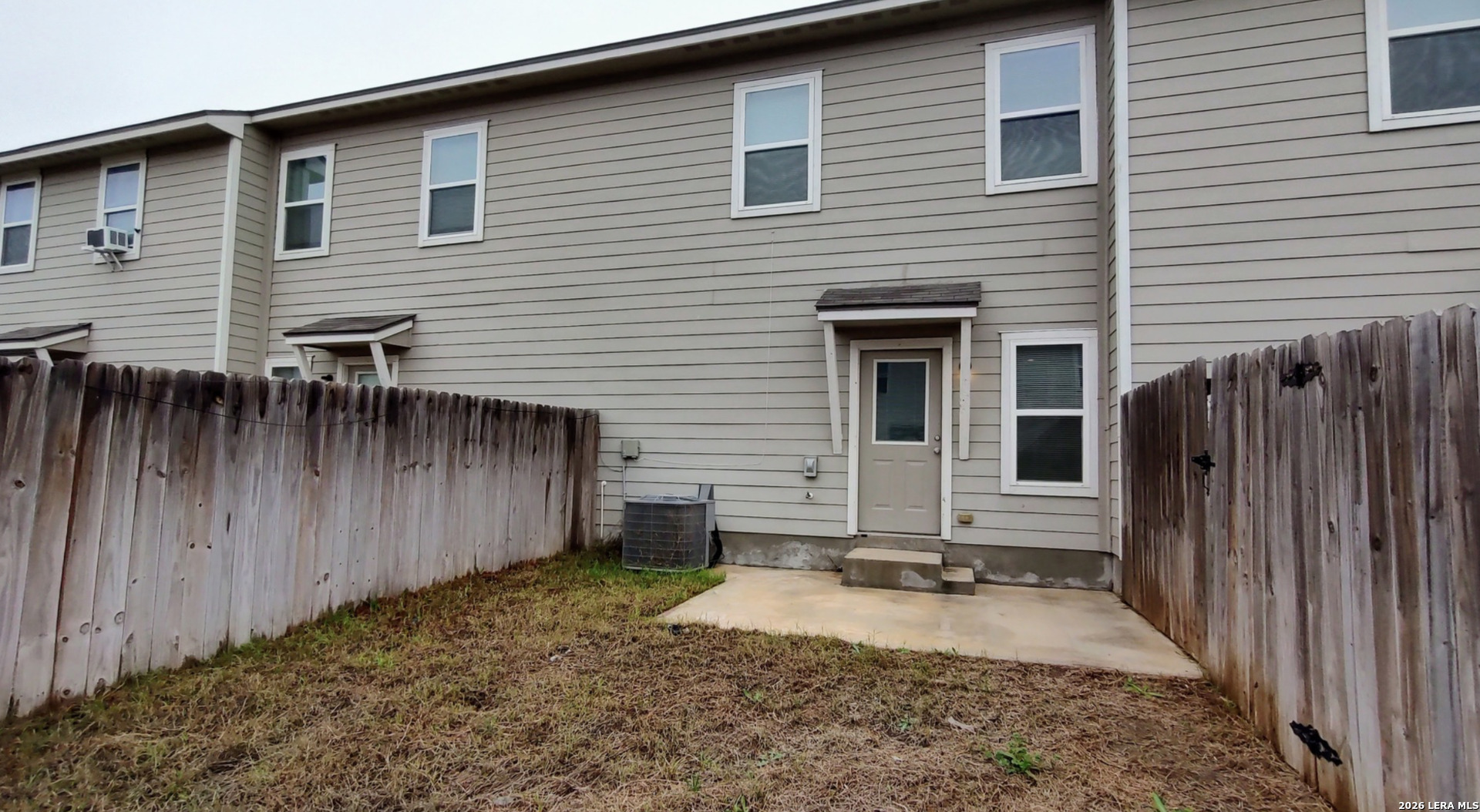 16901 Dancing Ava Selma, TX 78154 - Photo 12 of 14 a view of house with backyard and wooden fence