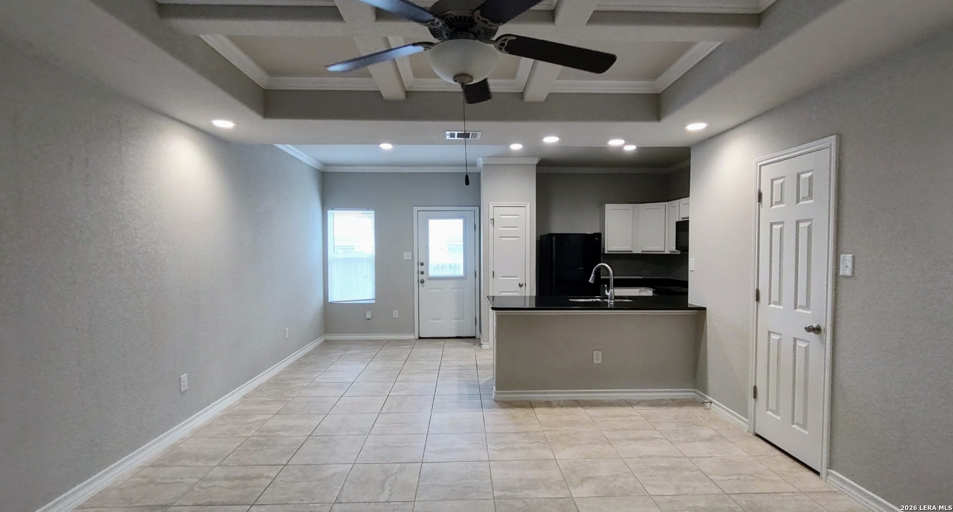 16901 Dancing Ava Selma, TX 78154 - Photo 2 of 14 a large kitchen with a sink and stainless steel appliances